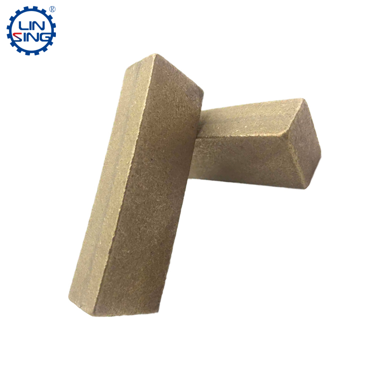 After the diamond segment is sintered and demolded, the shape of the diamond segments has been formed, especially after the post-processing process, the basic segments has no major problems. In theory, it can be packaged, but in many cases, responsible The factory also needs to perform the last step of processing on the segment——grinding wheel, so why do we need to grind the diamond segments with grinding wheel? Here are some specific reasons:  1: Remove burrs on the surface of the diamond segment  Sometimes, during the stirring process of the diamond segments, some burrs have not been dealt with, especially some small burrs in the corners. Small, the grain size of the grinding wheel disc is relatively fine. It is best to use the grain size of #1500-#3000 to grind the diamond segments, so that the burr can be quickly removed, and the protective layer on the surface of the diamond segments will not be damaged, and there will be no In contact with air, rust spots appear quickly. diamond segment  2: Removal of flow solids  In the process of cutting the diamond segments, sometimes, during the sintering process of the diamond segments, the flow rate of the diamond segments will obviously appear due to the high pressure, the high sintering temperature, or the quality difference of the diamond segments cold pressing. The specific performance is that the appearance of the diamond segments has some solid flow, which is rather ugly. In the process of use, this kind of diamond segments will have some influences of poor cutting quality due to its large width, such as increasing the cutting seam and slate. There are scratches, and it is very easy to chip when cutting. Therefore, when we grind, we can grind off the part of the flowing material, which can ensure the quality and efficiency of cutting to the greatest extent. In the specific grinding and polishing process, the large-grained grinding wheel is used to process the large-area flow material, and then the fine-grained grinding wheel is used for grinding and polishing.   3: Diamond open  Not all diamond segments need to be diamond open, such as cutting granite, sandstone, basalt and other stones, most of these stones have strong wear resistance, which has a strong consumption for the diamond segments matrix, so almost cutting these diamond segments There is no need for diamond open, but if cutting some low-wear-resistant diamond segments, such as talc, marble, limestone and other materials, because the diamond segments carcass is difficult to consume, in order to improve the cutting efficiency, the surface layer is quickly consumed. The diamond segments is very important. In order to better edge the marble diamond segments, parallel diamond segments and arc-shaped diamond segments are more common, while other diamond segments are generally not used for non-wear-resistant stone cutting due to the complicated cutting edge.   4: grinding the bottom of diamond segment  Diamond segments bottom grinding is a way to increase the roughness of the bottom of the diamond segments. It is mainly to enhance the welding area between the diamond segments and the base bond. In the process of welding the diamond segments, it is more convenient and makes the diamond segments more stable. connected to the base. Generally speaking, for cutting hard stone, the higher the welding strength, the better the impact resistance, and the welding area directly affects the welding firmness, so rough welding has a decisive effect on the high-strength fixed diamond segments.